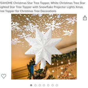 Christmas Tree Topper.  LED lights with projector.  Still in box
